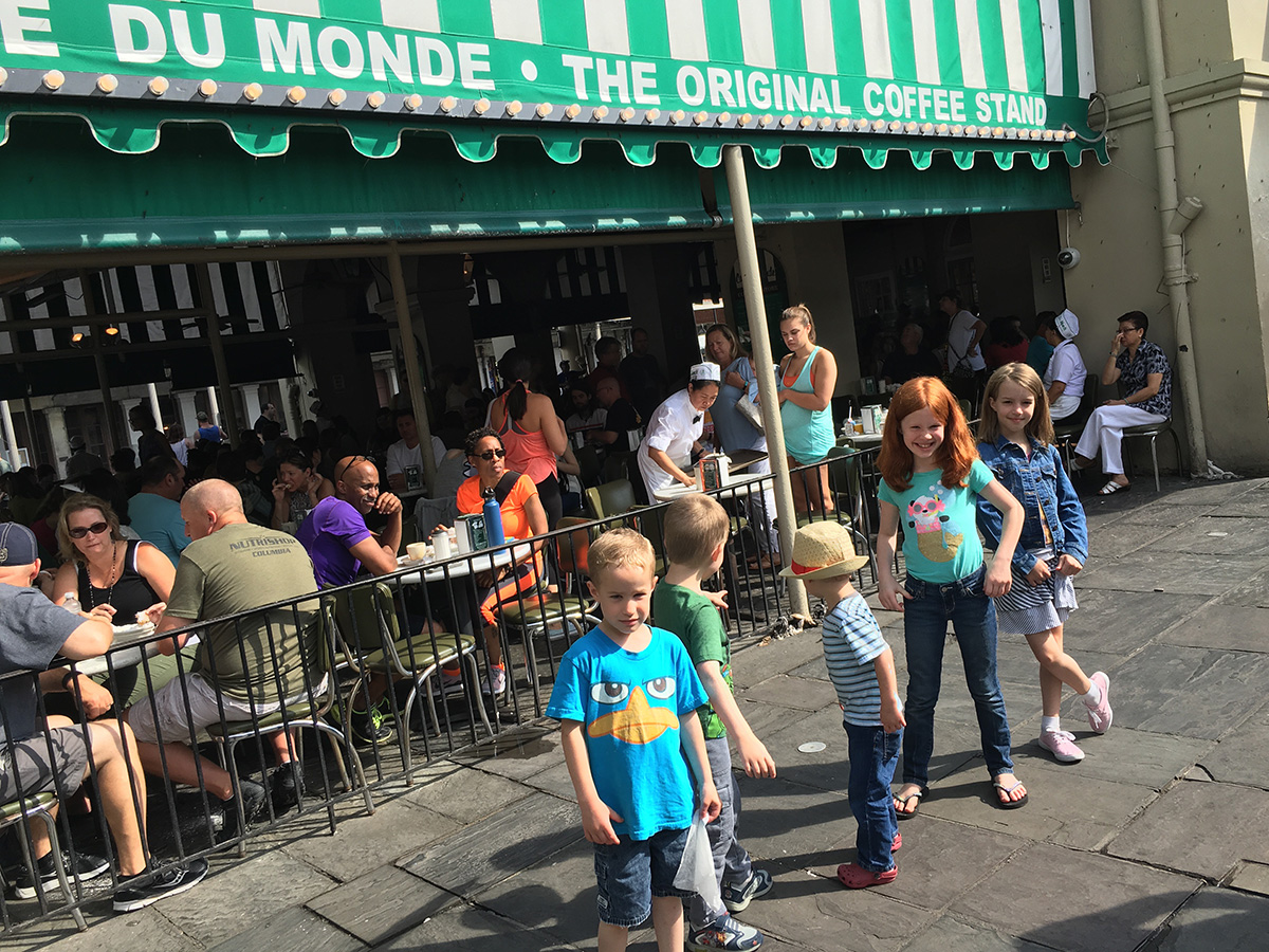 Cafe du Monde: the kids refusing to pose for a photo after we had the "French donuts" for breakfast.